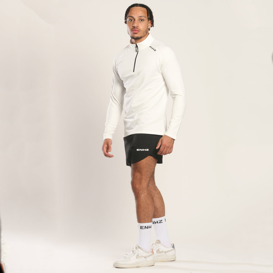 VITALITY HALF ZIP TEE